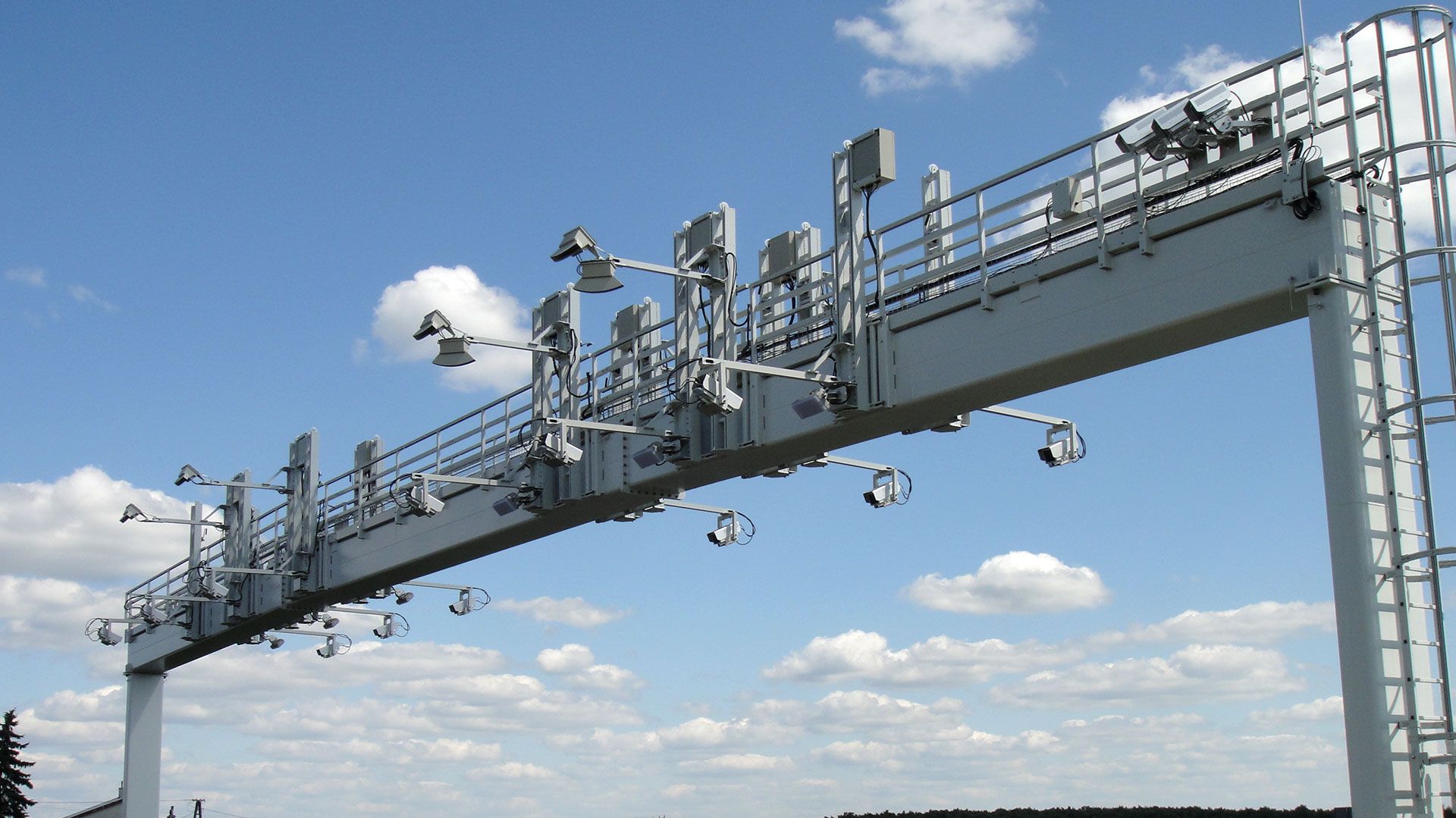Overhead MLFF tolling gantry with ANPR cameras and sensor assemblies